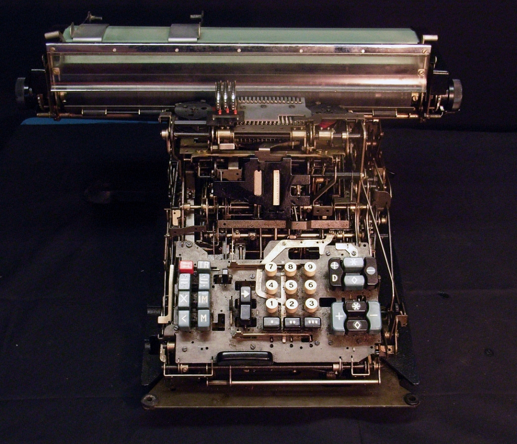 Copy of RIMG0049_cra.jpg - All pictures show the naked machine. The mechanism was the brainchild of  Natale Cappelaro  and  Marcello Nizzoli  designed the form.  About 6 million Tetractys calculators were built between 1956 and ~1975.                                          